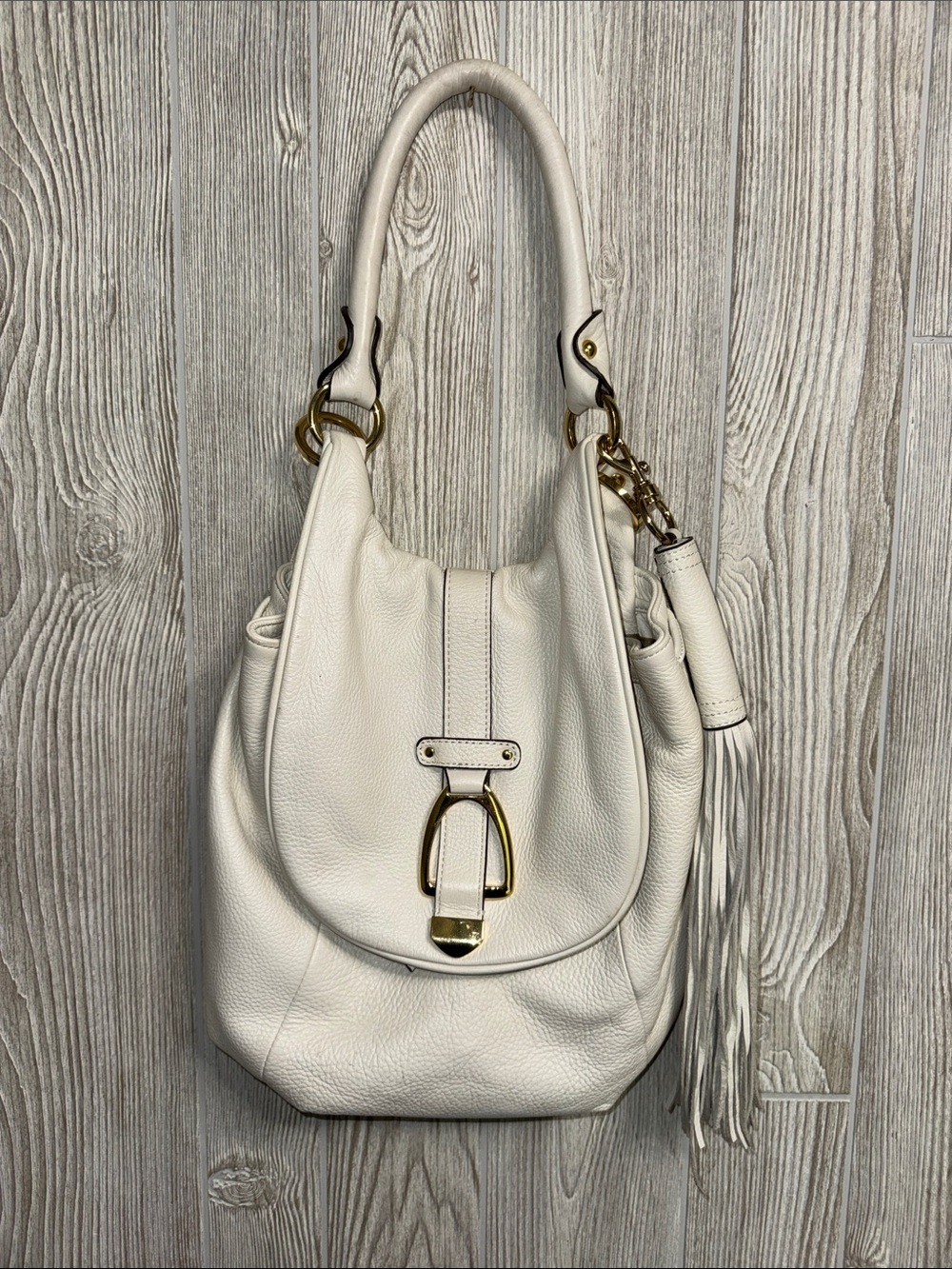 G.I.L.I. White Leather Shoulder Bag with Tassel and Gold Hardware